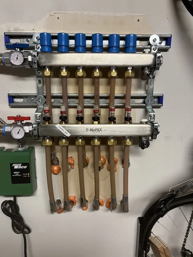 Plumber performing Water Heater Repair at a residential property in New Haven